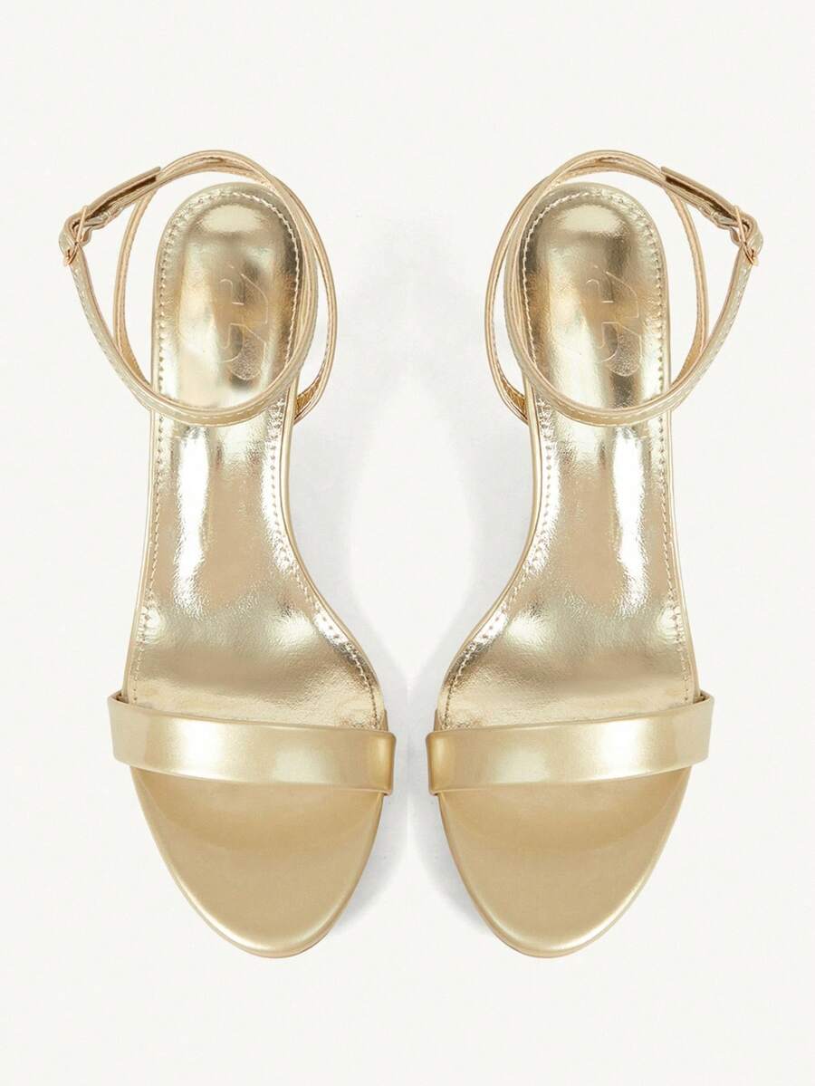 Women's open-toed high-heeled sandals featuring a 5.5cm kitten heel stiletto, sleek ankle strap with buckle closure, and smooth PU leather finish.