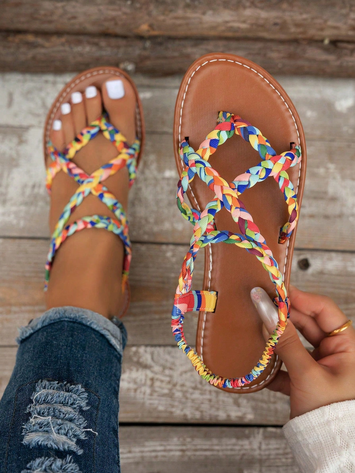 Women's lace-up flat slip-on sandals with round toe and hollow-out PU leather straps for beach and daily wear.