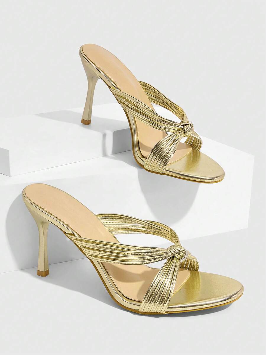 Women's high heel sandals with knotted thin straps, open round toe, and sleek stiletto thin heel.