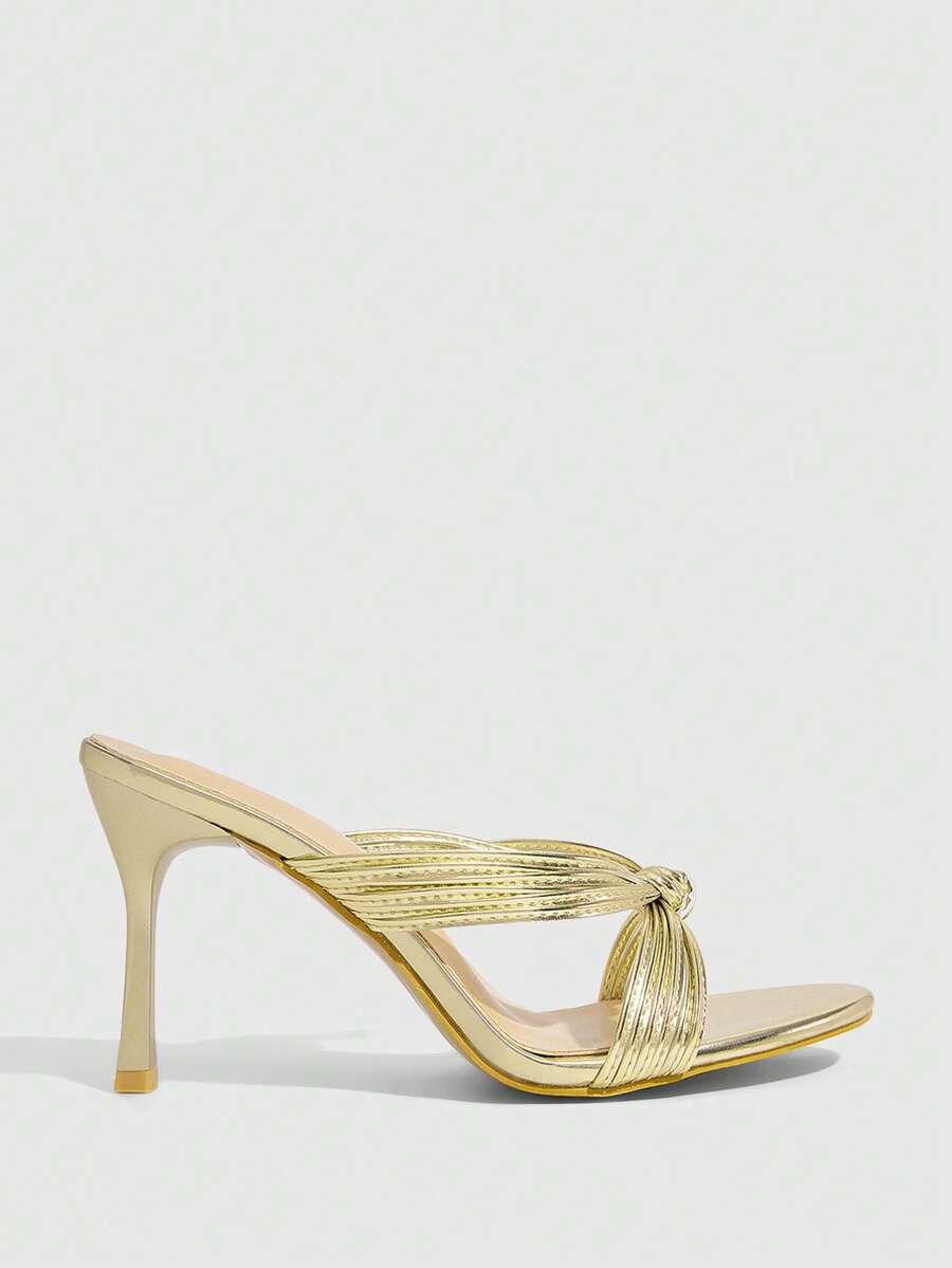 Women's high heel sandals with knotted thin straps, open round toe, and sleek stiletto thin heel.