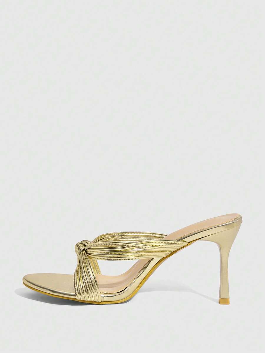 Women's high heel sandals with knotted thin straps, open round toe, and sleek stiletto thin heel.