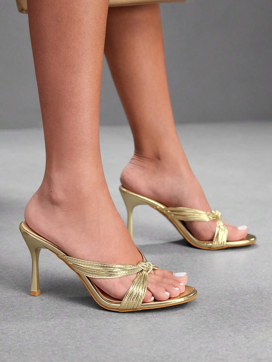 Women's high heel sandals with knotted thin straps, open round toe, and sleek stiletto thin heel.