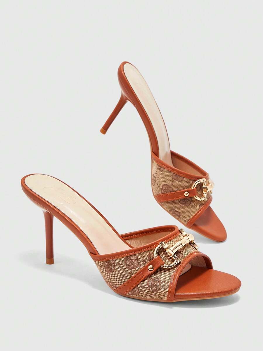 Beige pointed toe mule high heel sandals featuring gold buckle accent