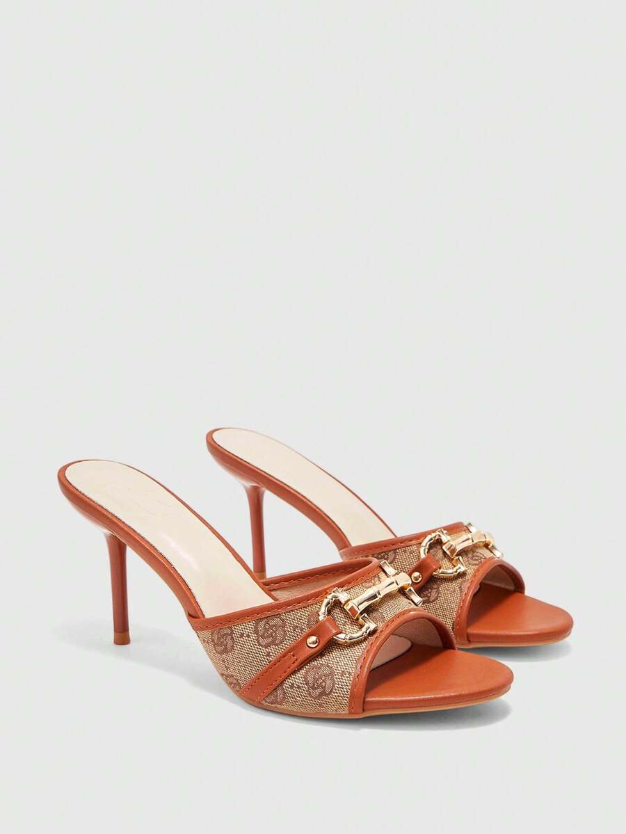 Beige pointed toe mule high heel sandals featuring gold buckle accent