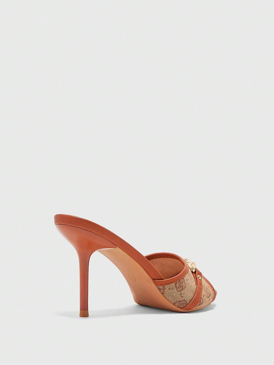 Beige pointed toe mule high heel sandals featuring gold buckle accent