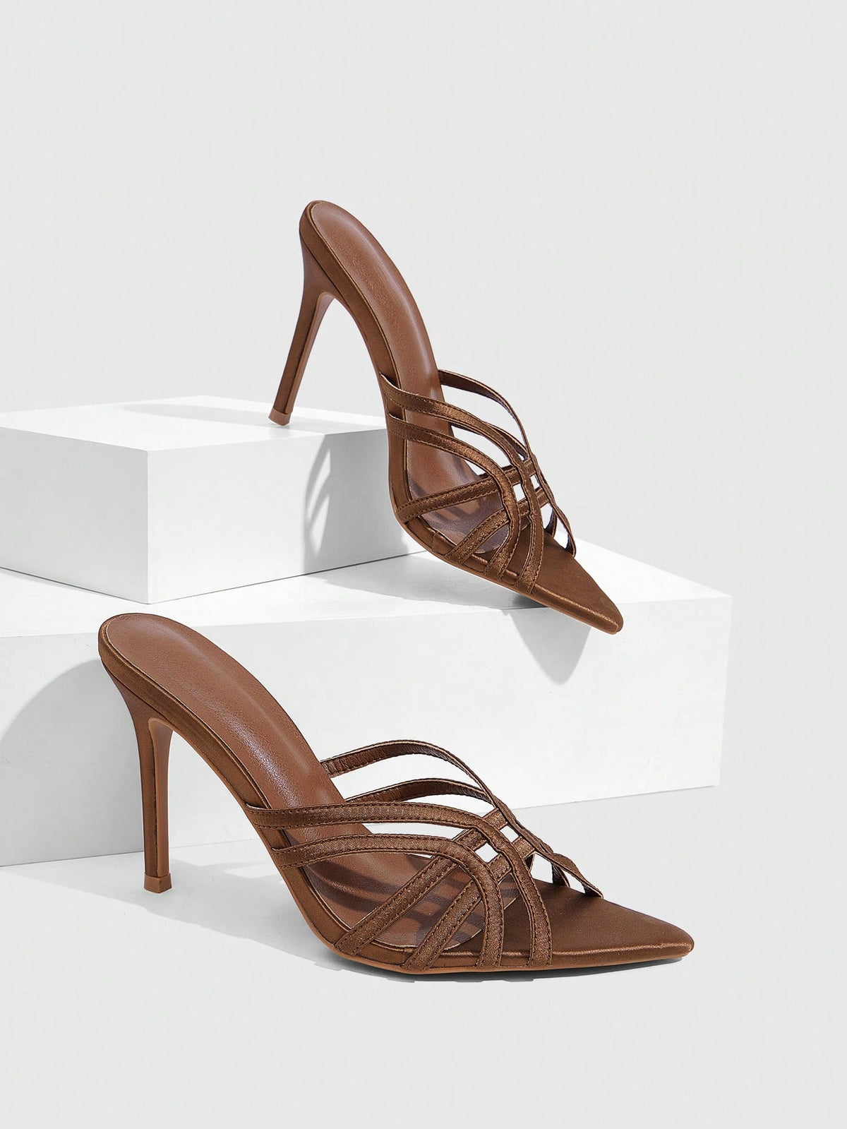 Women's brown flannel pointed open-toe heeled sandals featuring a slip-on mule design with high stiletto heels.