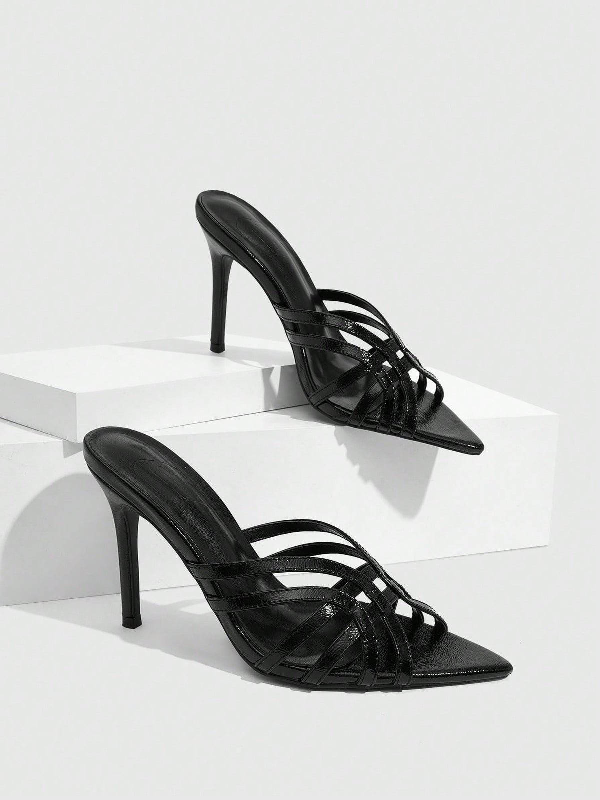 Women's brown flannel pointed open-toe heeled sandals featuring a slip-on mule design with high stiletto heels.