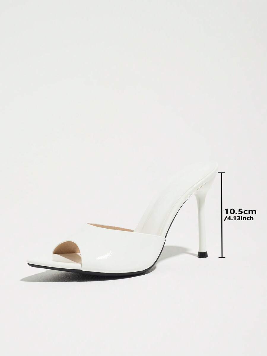 Women's coffee brown high heel mule shoes featuring a glossy mirror finish, open toe design, and sleek stiletto heel.