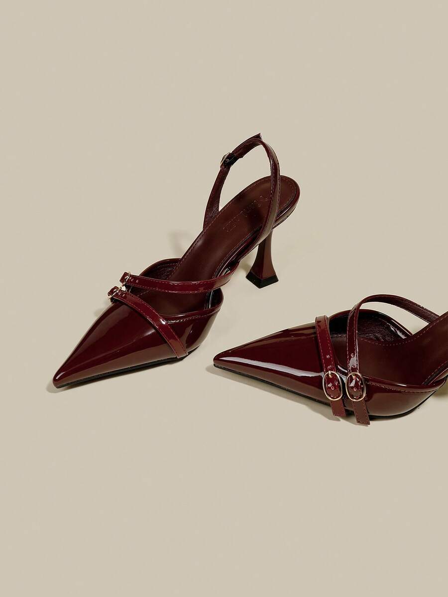 Women's coffee brown patent leather slingback pumps with pointed closed toe and sculpted wine glass high heel.