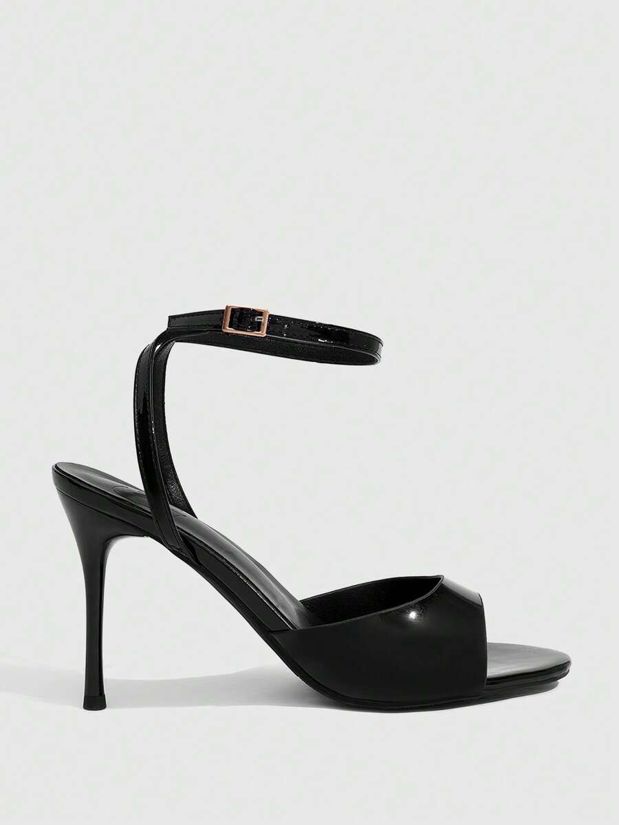 Women's patent leather stiletto sandals with open toe and ankle buckle strap