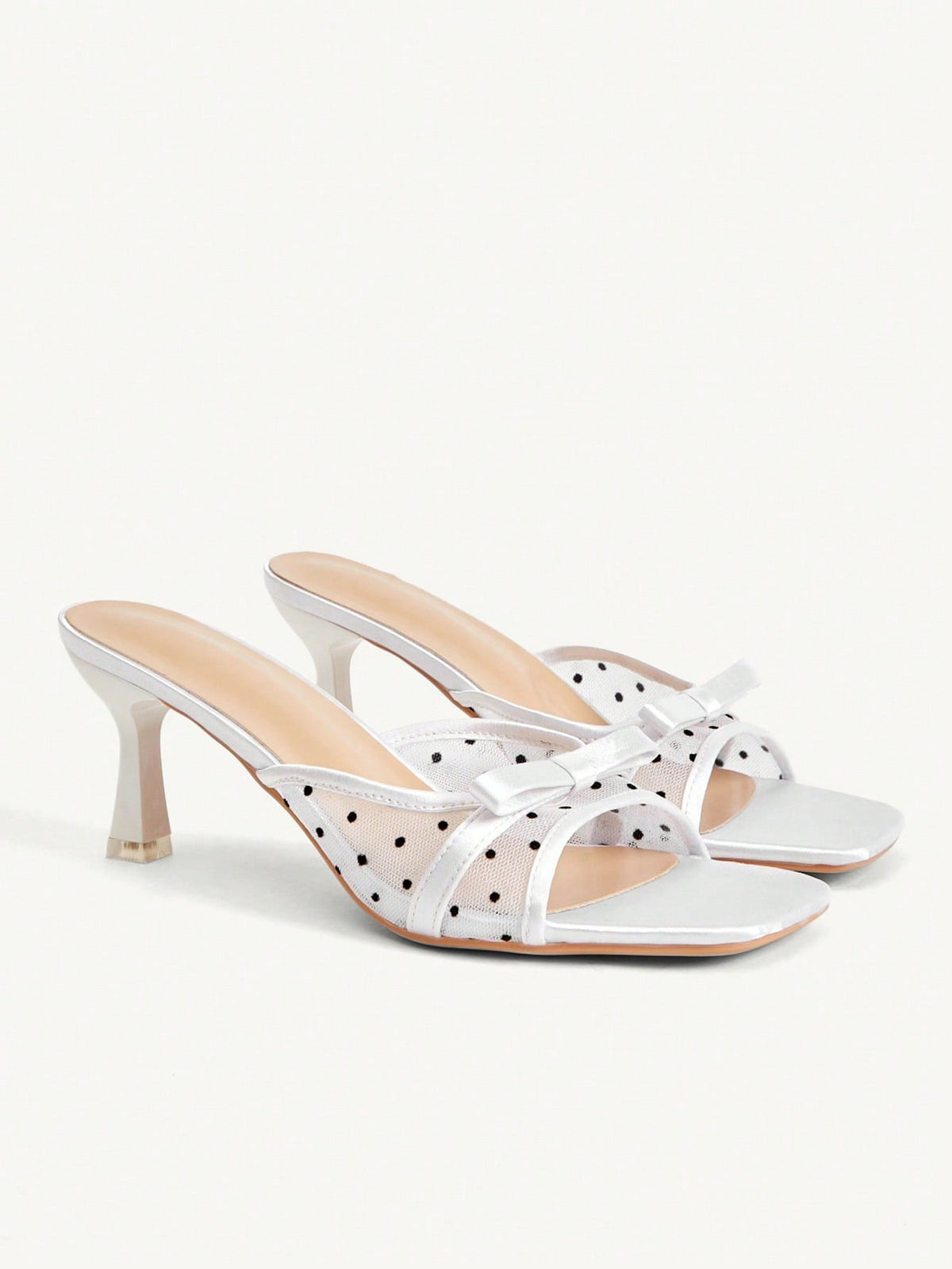 Pair of women's open toe stiletto heeled sandals crafted in satin with a bow accent