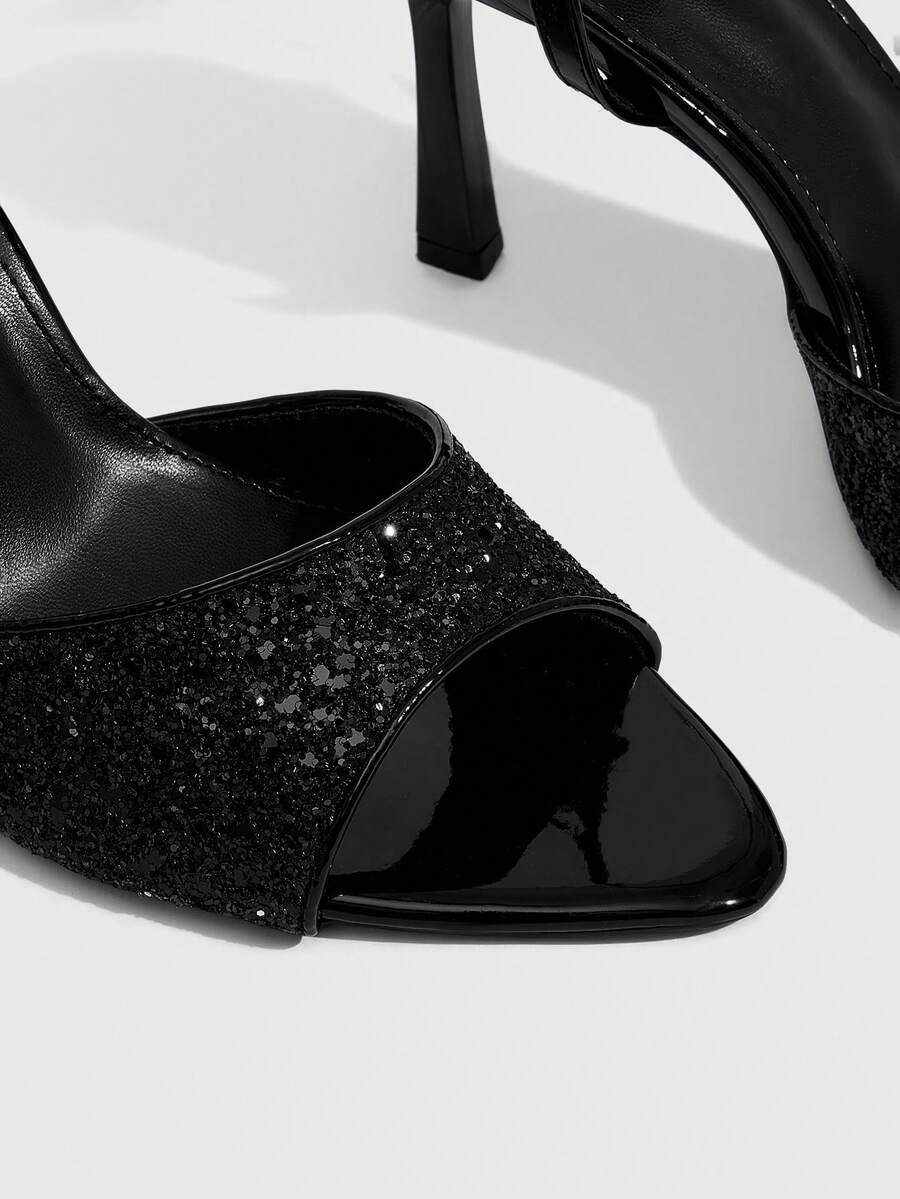 Sequin decorated high heel sandals featuring an open toe design, stiletto heel, and adjustable ankle strap buckle.