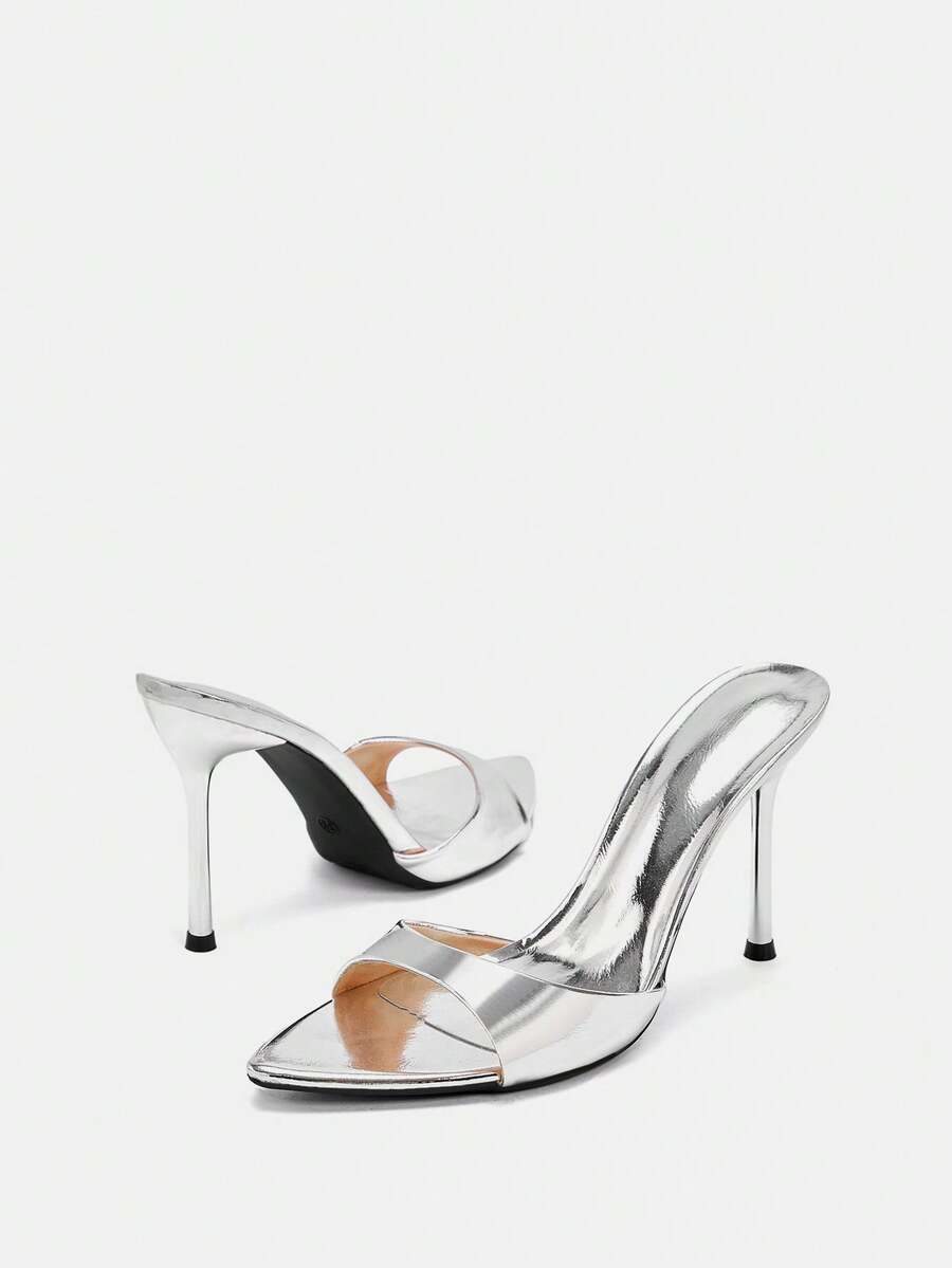 Pair of pointed toe stiletto heel mule sandals with a glossy finish and electroplated thin high heel for wedding and evening party events.