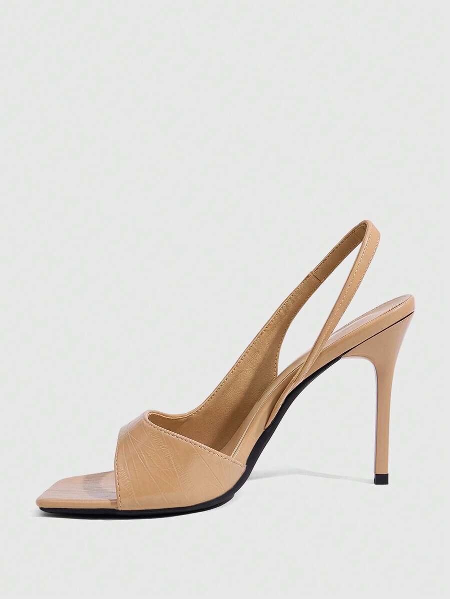 Women's burgundy open toe high heel sandals featuring an embossed finish and slingback strap