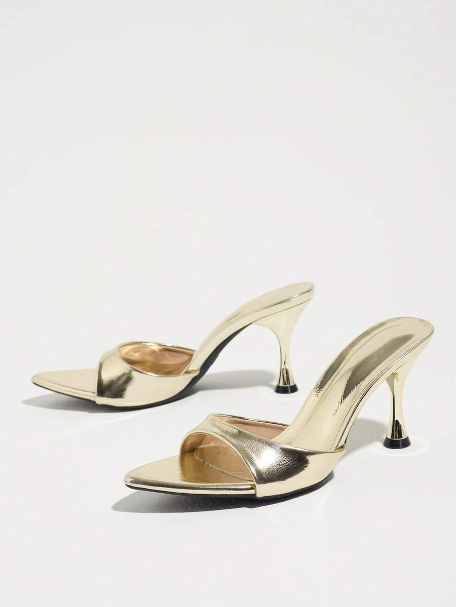 Women's open pointed toe stiletto mule high heel sandals featuring a glossy slip-on design.