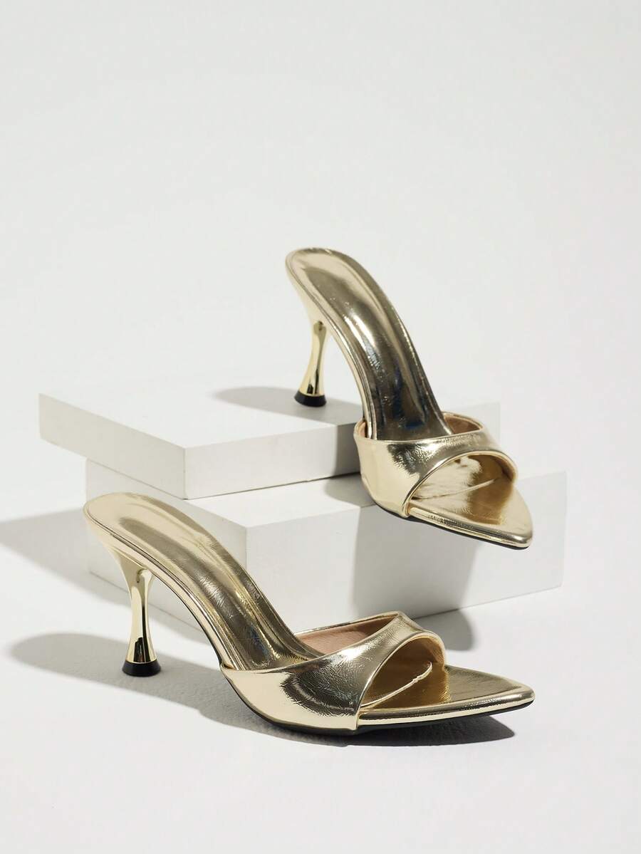 Women's open pointed toe stiletto mule high heel sandals featuring a glossy slip-on design.