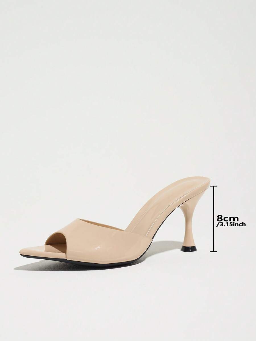 Women's open pointed toe stiletto mule high heel sandals featuring a glossy slip-on design.