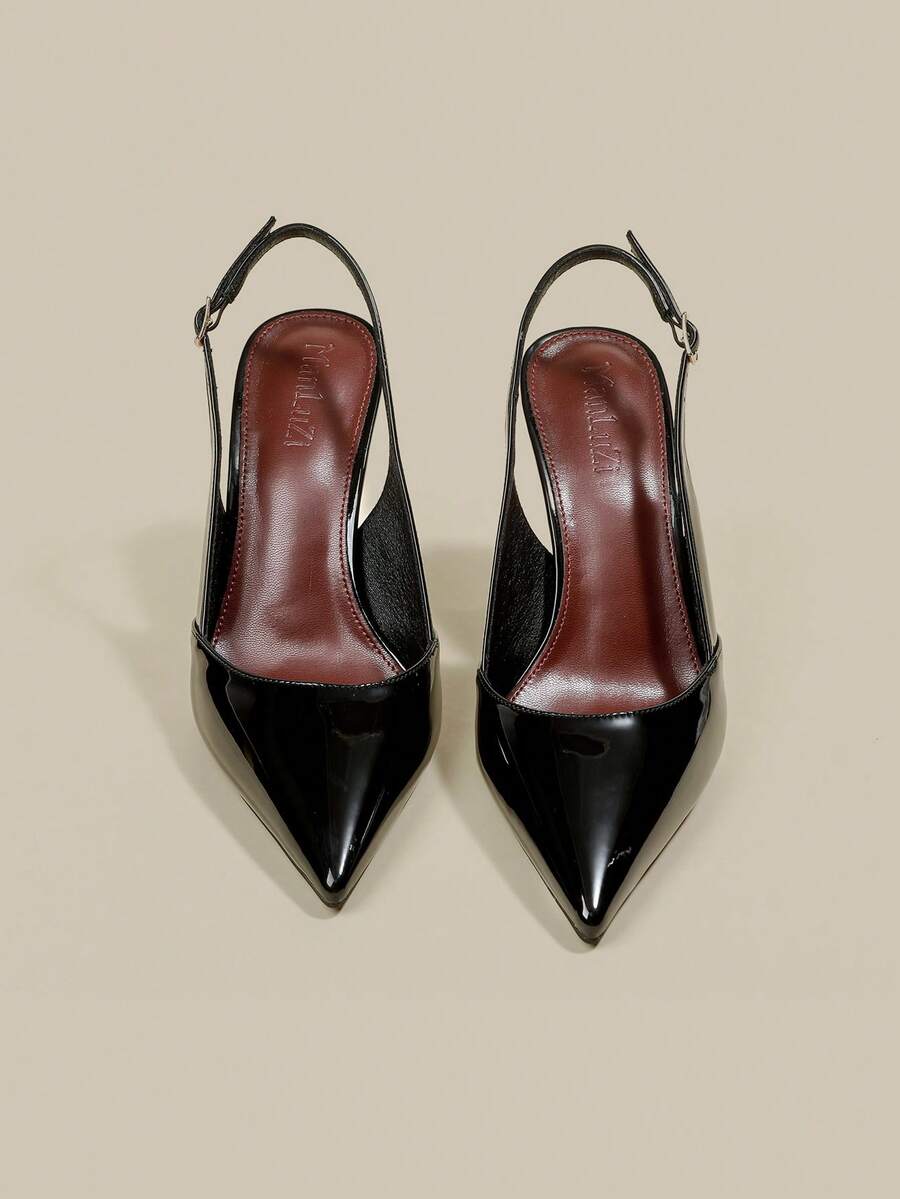 Women's pointed toe kitten heel pumps with adjustable buckle back strap and sleek patent finish.