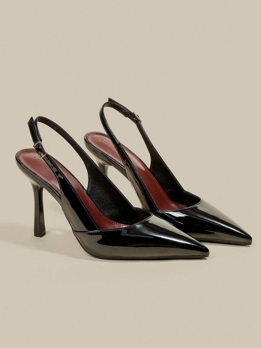 Women's pointed toe kitten heel pumps with adjustable buckle back strap and sleek patent finish.
