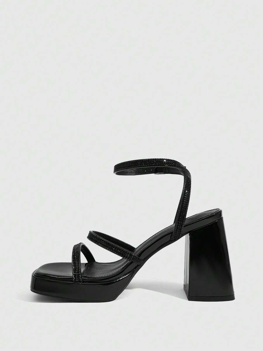 Women's high-heeled sandals with textured pattern, open toe design, chunky heel, and adjustable ankle buckle strap.