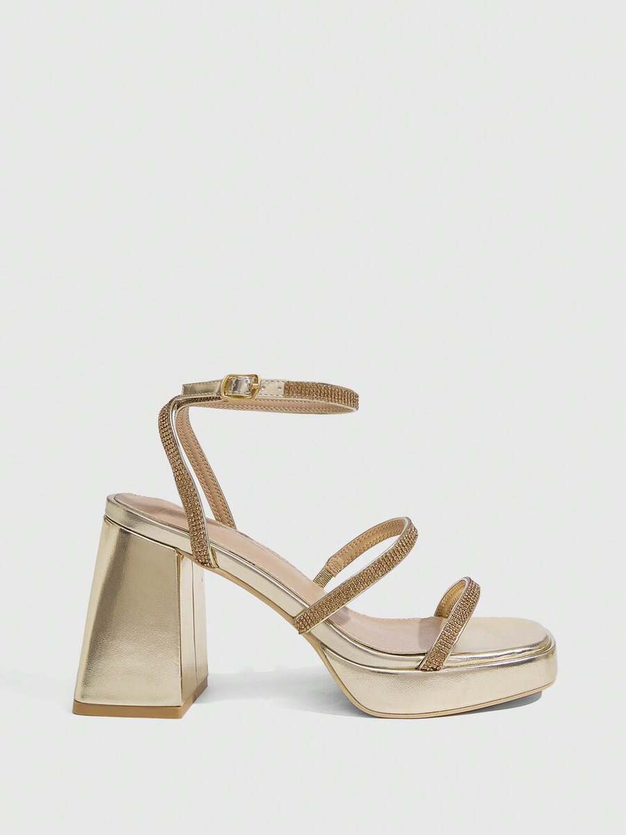 Women's high-heeled sandals with textured pattern, open toe design, chunky heel, and adjustable ankle buckle strap.
