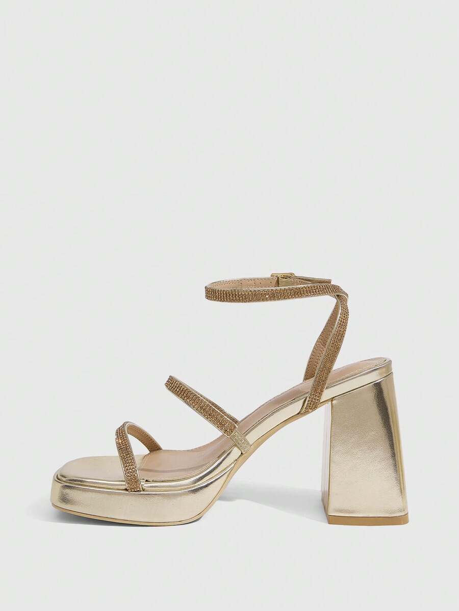Women's high-heeled sandals with textured pattern, open toe design, chunky heel, and adjustable ankle buckle strap.