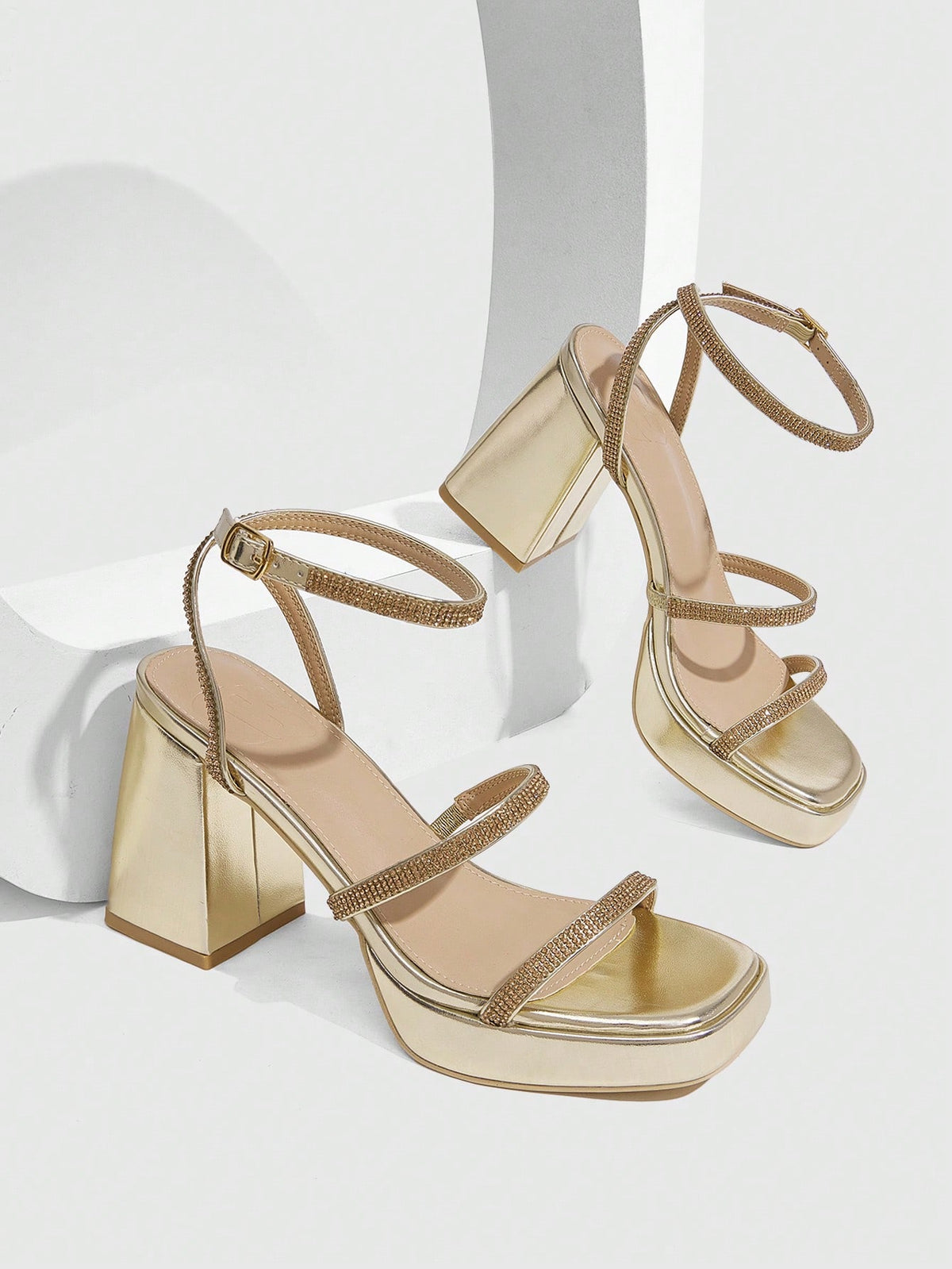 Women's high-heeled sandals with textured pattern, open toe design, chunky heel, and adjustable ankle buckle strap.