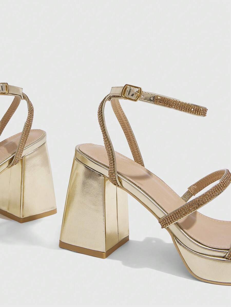 Women's high-heeled sandals with textured pattern, open toe design, chunky heel, and adjustable ankle buckle strap.