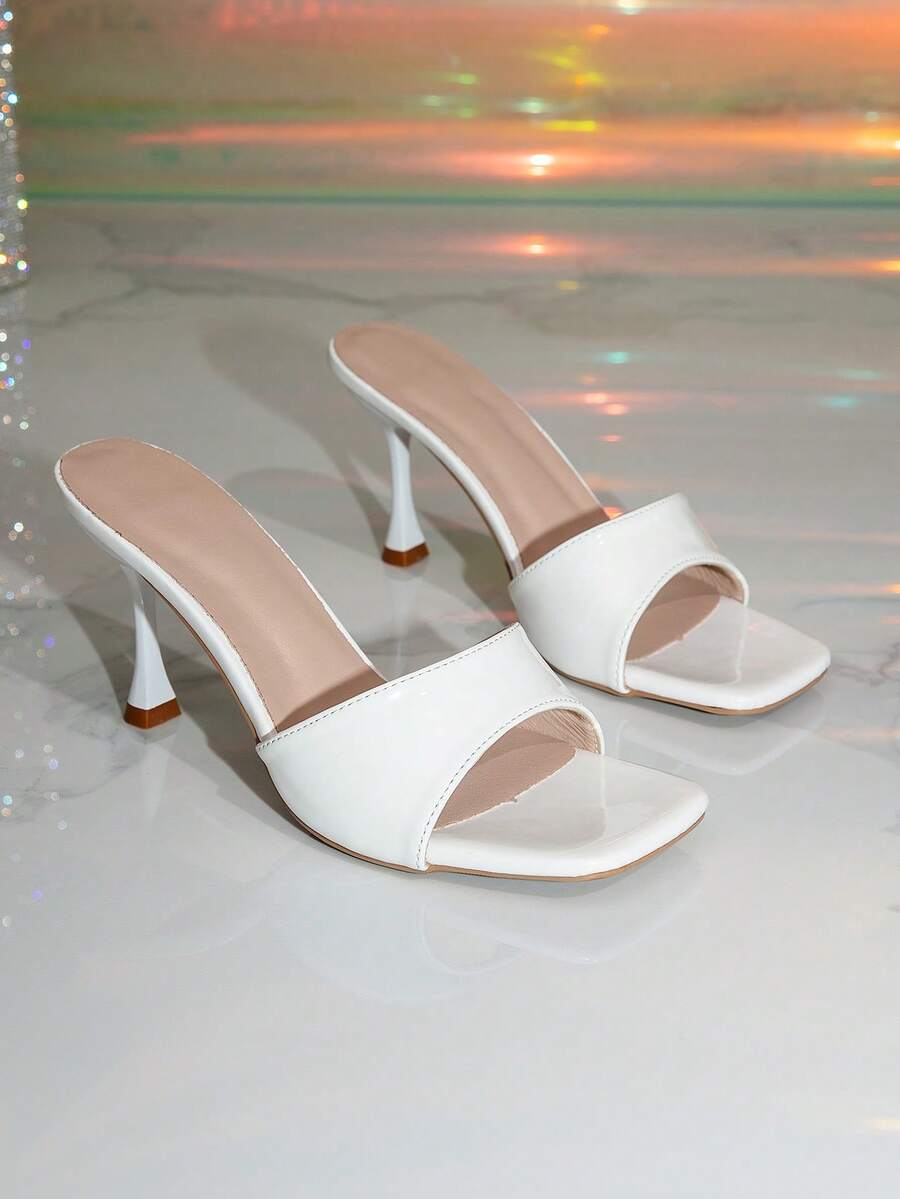 Women's square toe peep toe high heel mule sandals featuring smooth PU leather straps and a pyramid high heel.