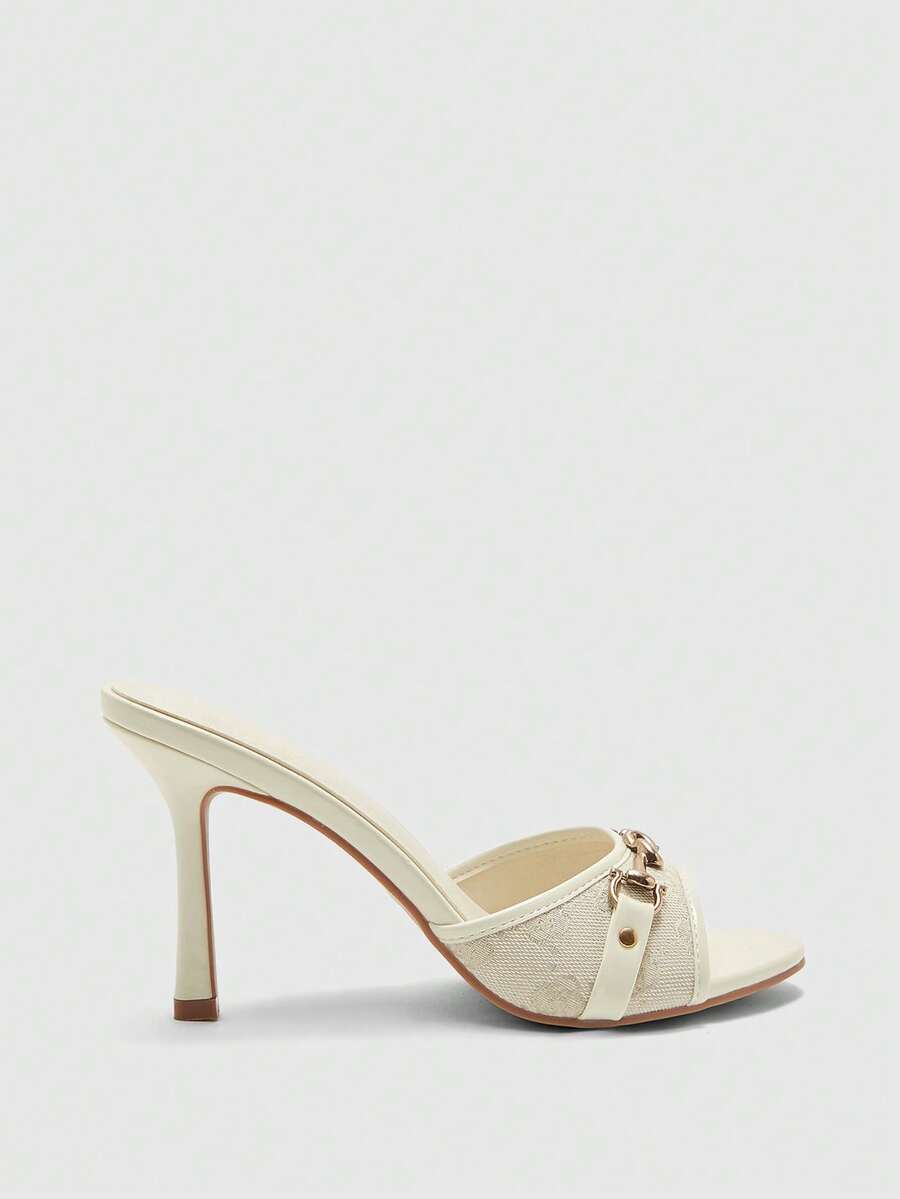 Women's beige high heel mule sandals with open round toe and metal chain detail