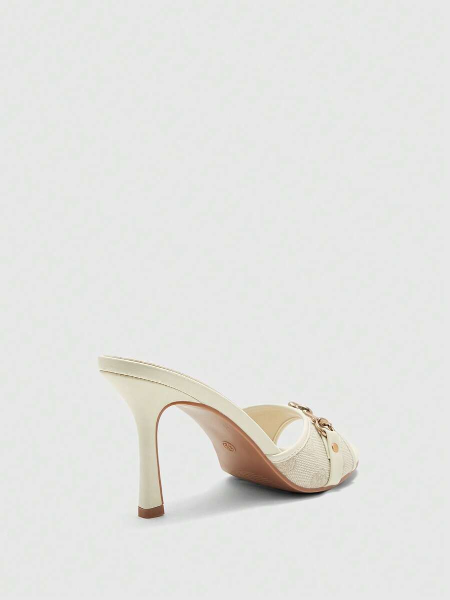 Women's beige high heel mule sandals with open round toe and metal chain detail