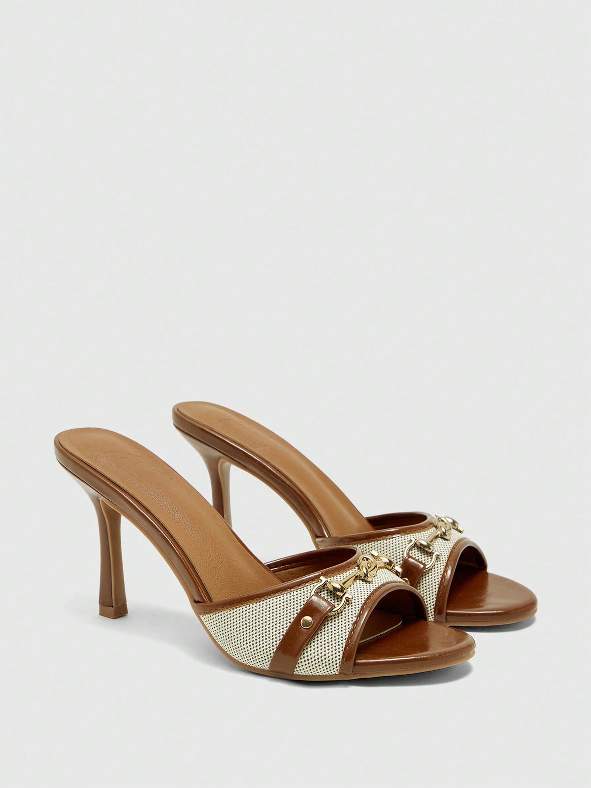 Women's beige high heel mule sandals with open round toe and metal chain detail