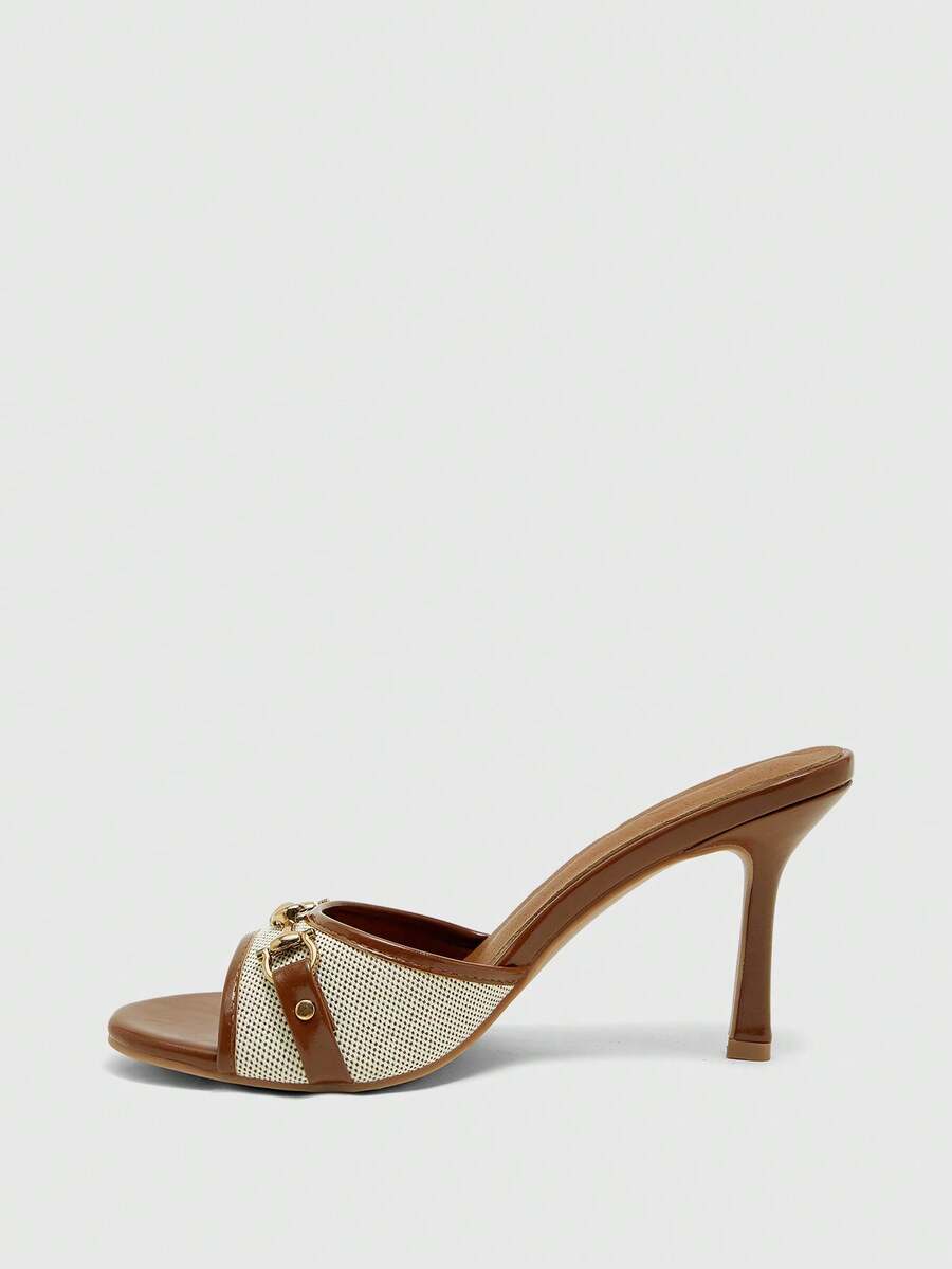 Women's beige high heel mule sandals with open round toe and metal chain detail
