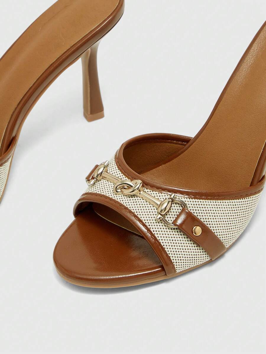 Women's beige high heel mule sandals with open round toe and metal chain detail