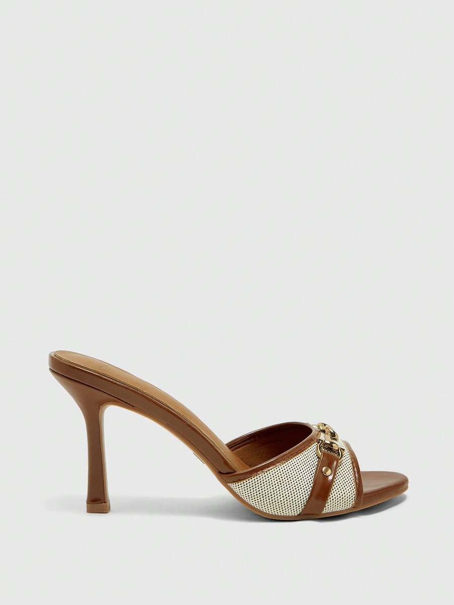 Women's beige high heel mule sandals with open round toe and metal chain detail