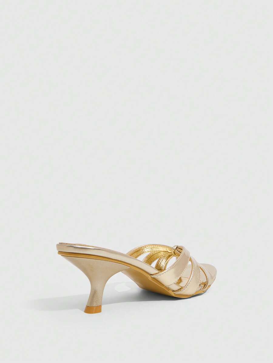 Women's open-toed high-heeled sandals featuring a 5.5cm kitten heel stiletto, sleek ankle strap with buckle closure, and smooth PU leather finish.