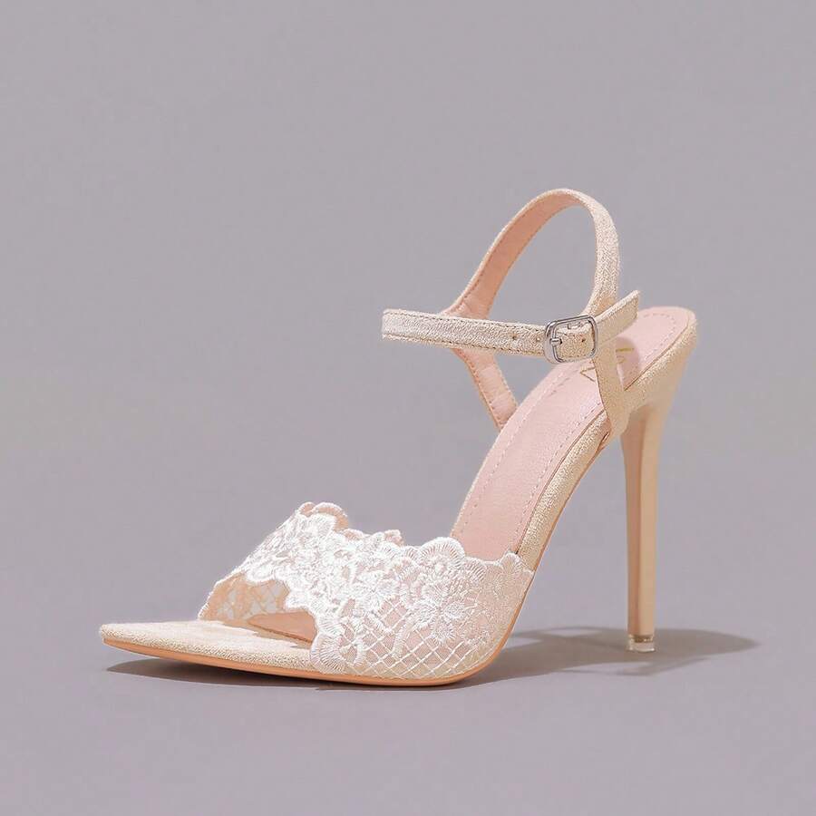 Lace stiletto high heel sandals with pointed open toe, ankle strap buckle, and bow detail