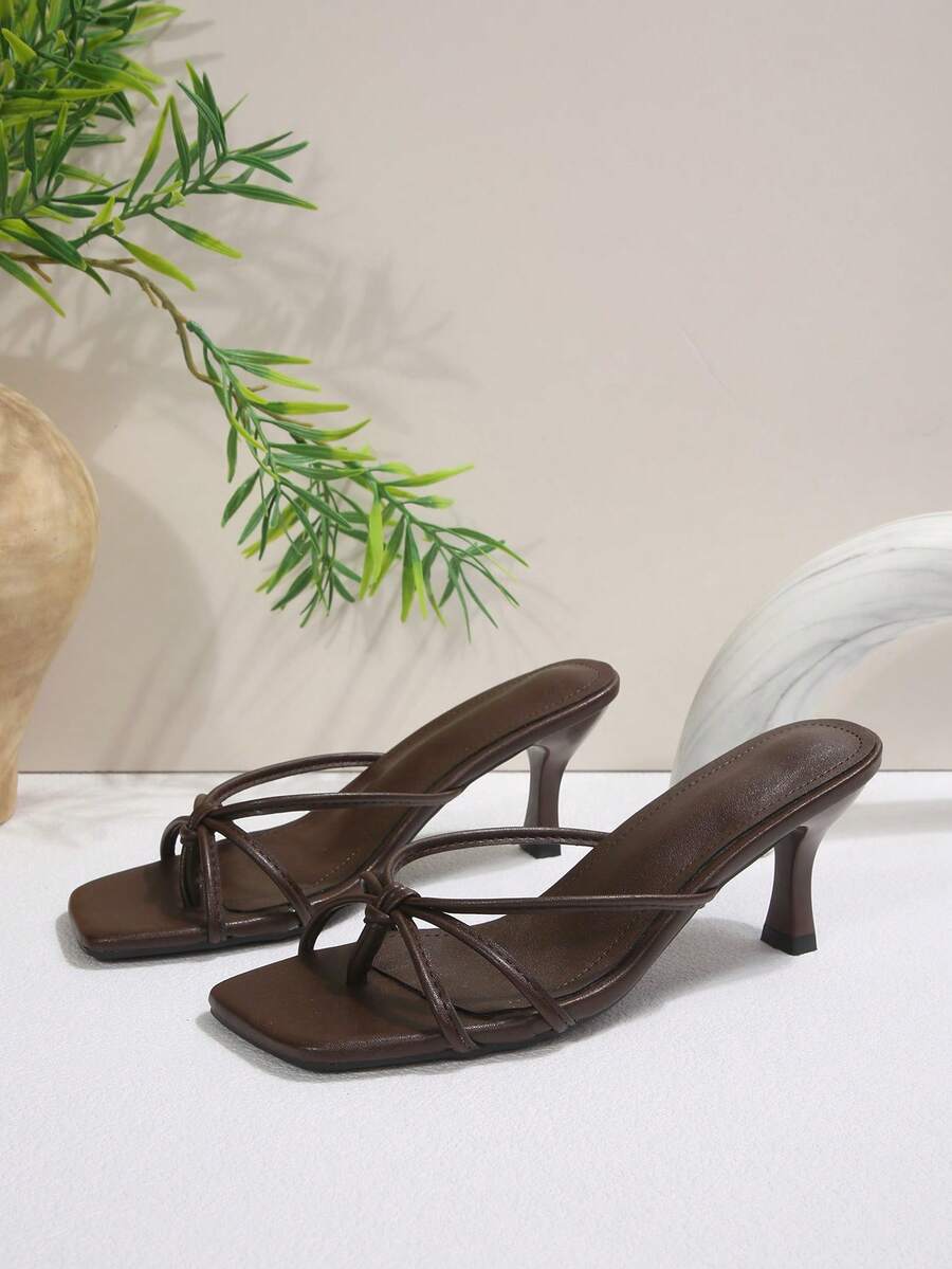 Women's open toe high heel slingback sandals with pyramid heel in solid color PU leather.