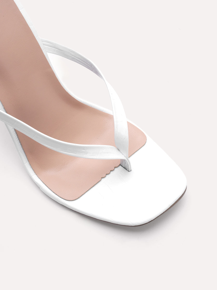 Women's metallic PU leather high heel sandals with open square toe, T-strap design, and stiletto heel in white