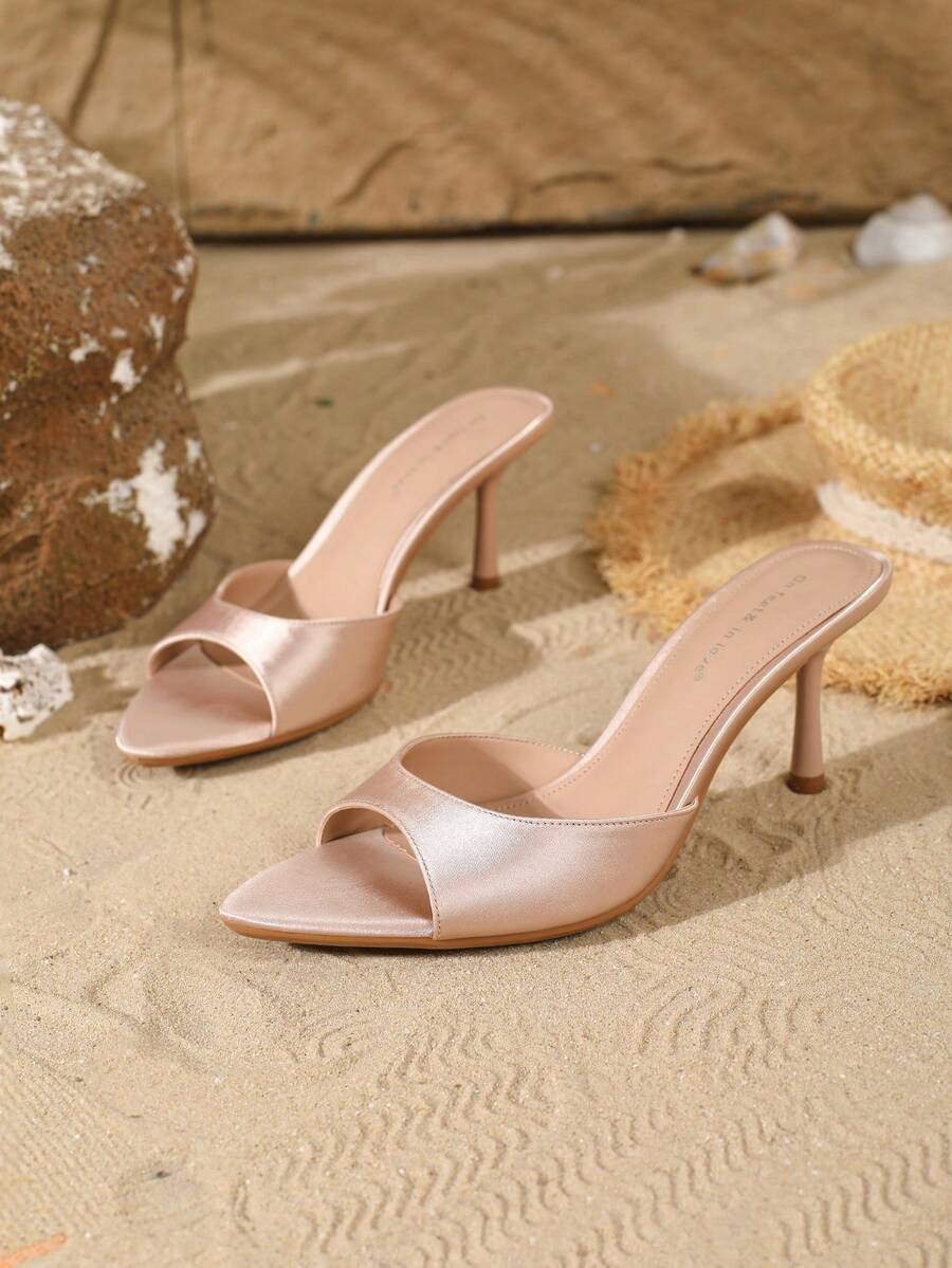 Women's open toe slip-on high heel sandals featuring a smooth satin strap and elegant stiletto mid heel.
