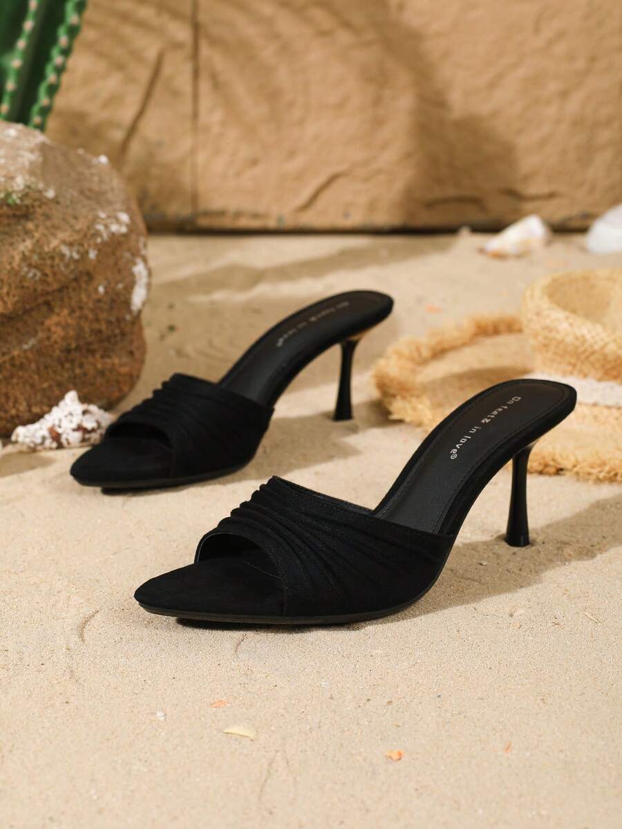 Women's open toe slip-on stiletto heel sandals featuring pleated satin design.