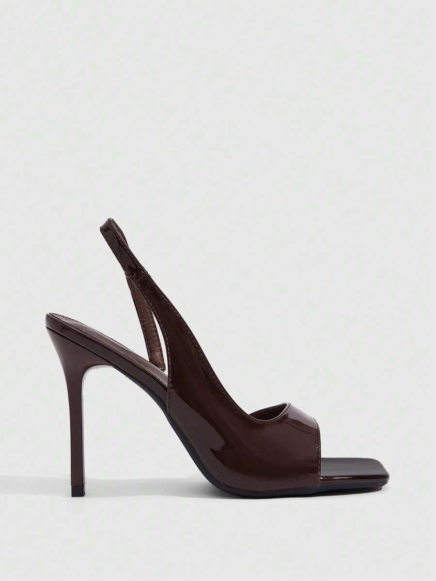Women's burgundy open toe high heel sandals featuring an embossed finish and slingback strap