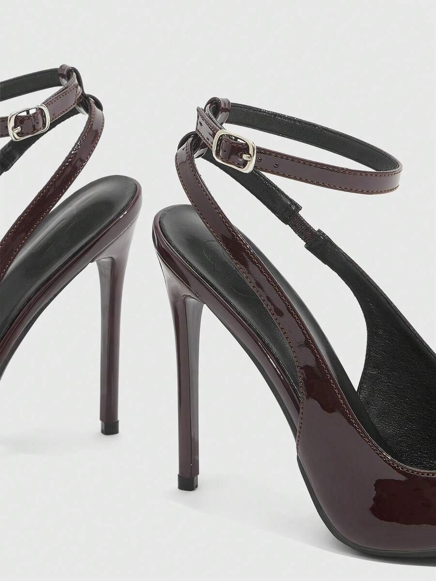 Pointed toe stiletto high heels with slingback silhouette and adjustable buckle ankle strap.