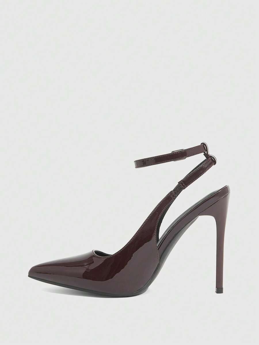 Pointed toe stiletto high heels with slingback silhouette and adjustable buckle ankle strap.