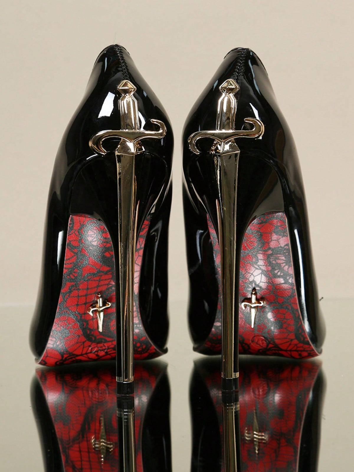 Glossy black pointed toe stiletto high heel pumps with bow detail for women