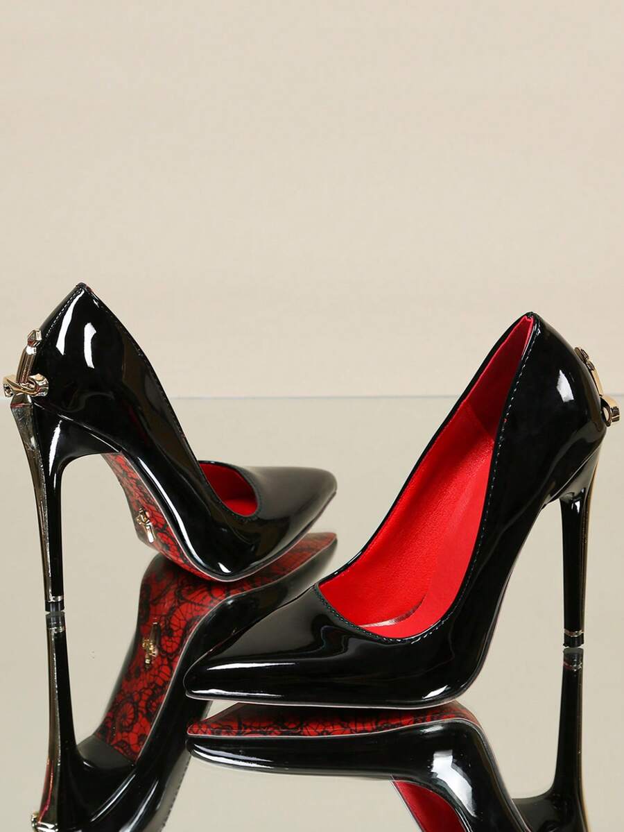 Glossy black pointed toe stiletto high heel pumps with bow detail for women