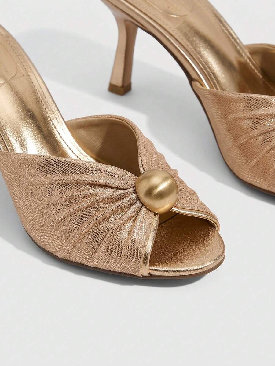 Pair of women's open toe kitten heel sandals and mules in sleek PU leather with rubber soles.
