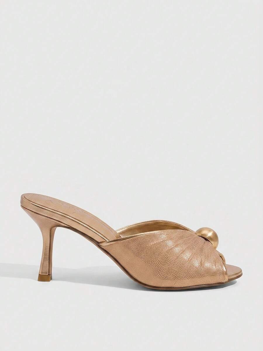 Pair of women's open toe kitten heel sandals and mules in sleek PU leather with rubber soles.