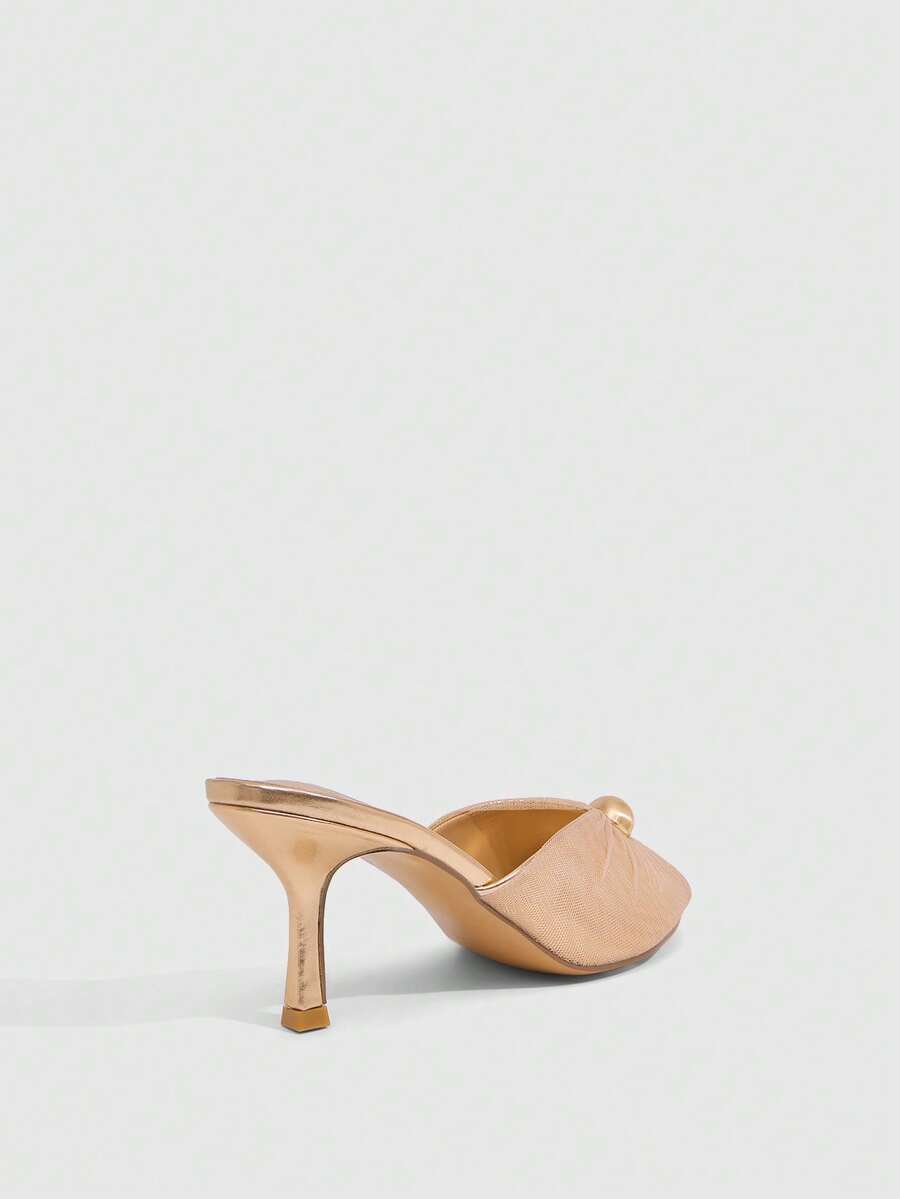 Pair of women's open toe kitten heel sandals and mules in sleek PU leather with rubber soles.