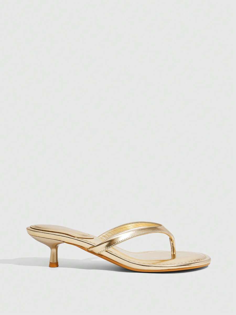 Women's kitten heel flip flop sandals featuring sleek PU leather straps, open toe, and low kitten heel.